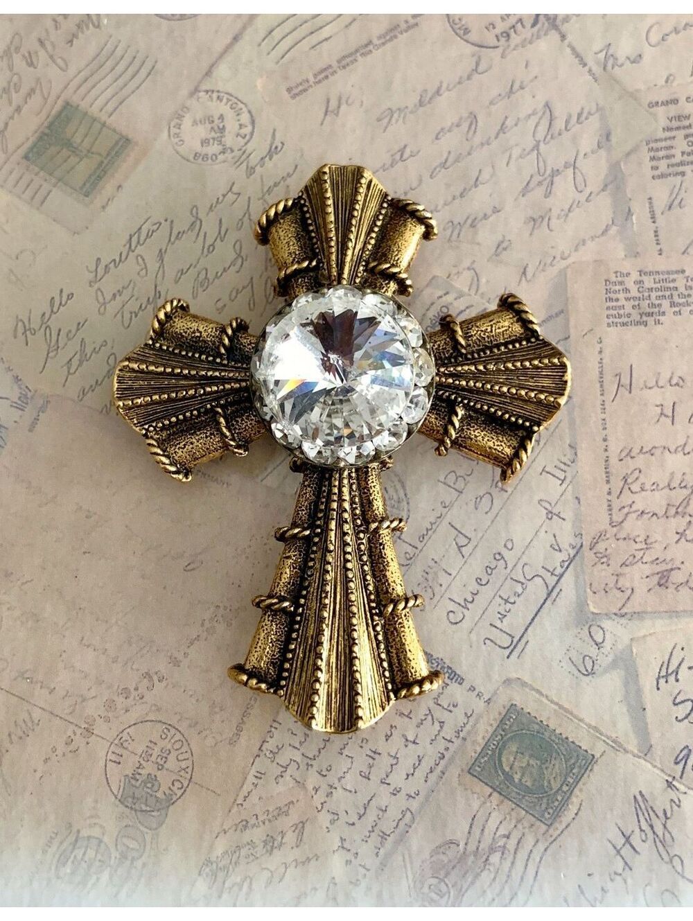 Gorgeous Gold Tone Cross Brooch with Sparkling Clear Rhinestone Center